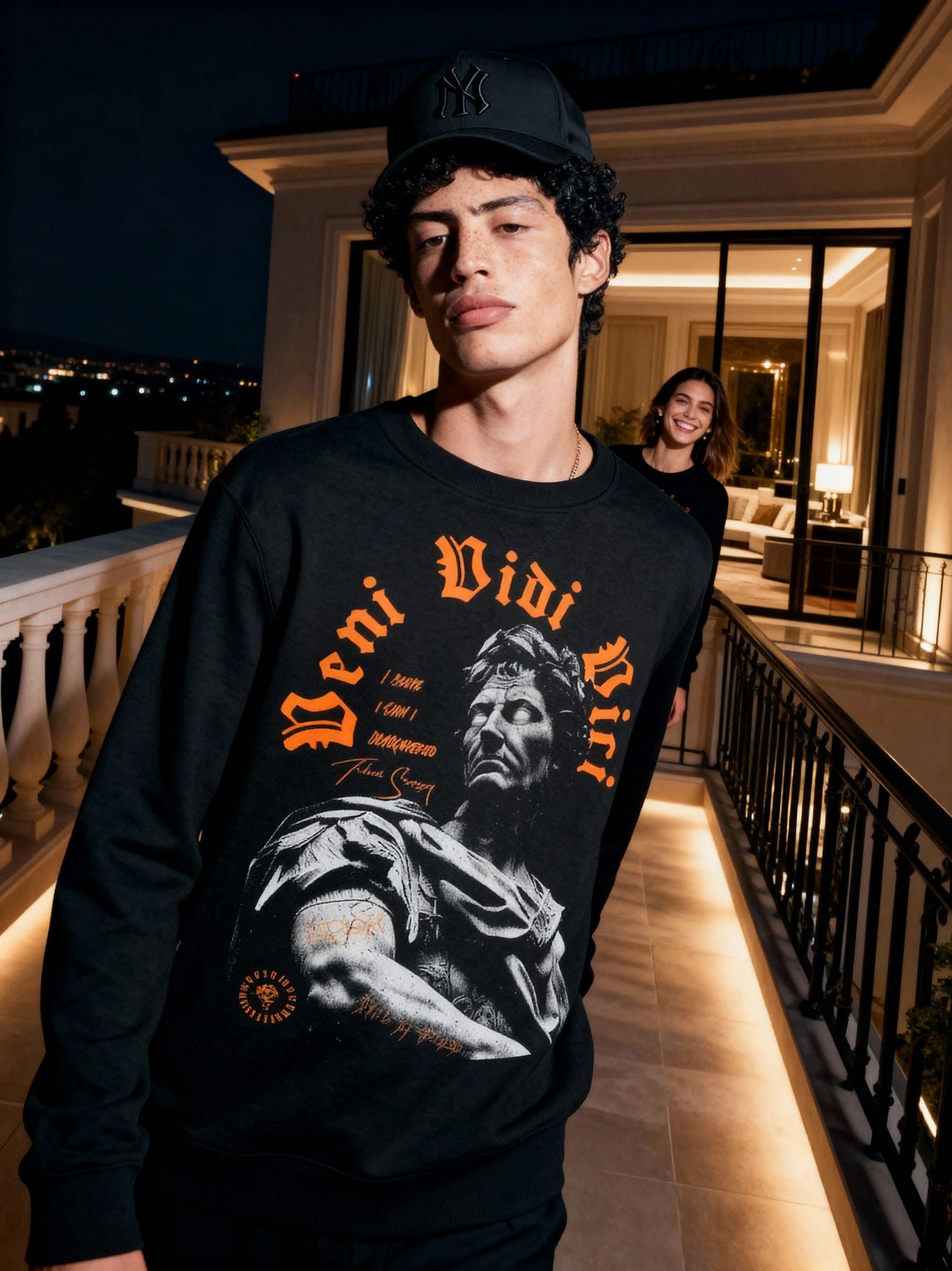 Men's Veni Vidi Vici pump cover sweatshirt – model in Julius Caesar crewneck on penthouse balcony at night. Warface Athletics.