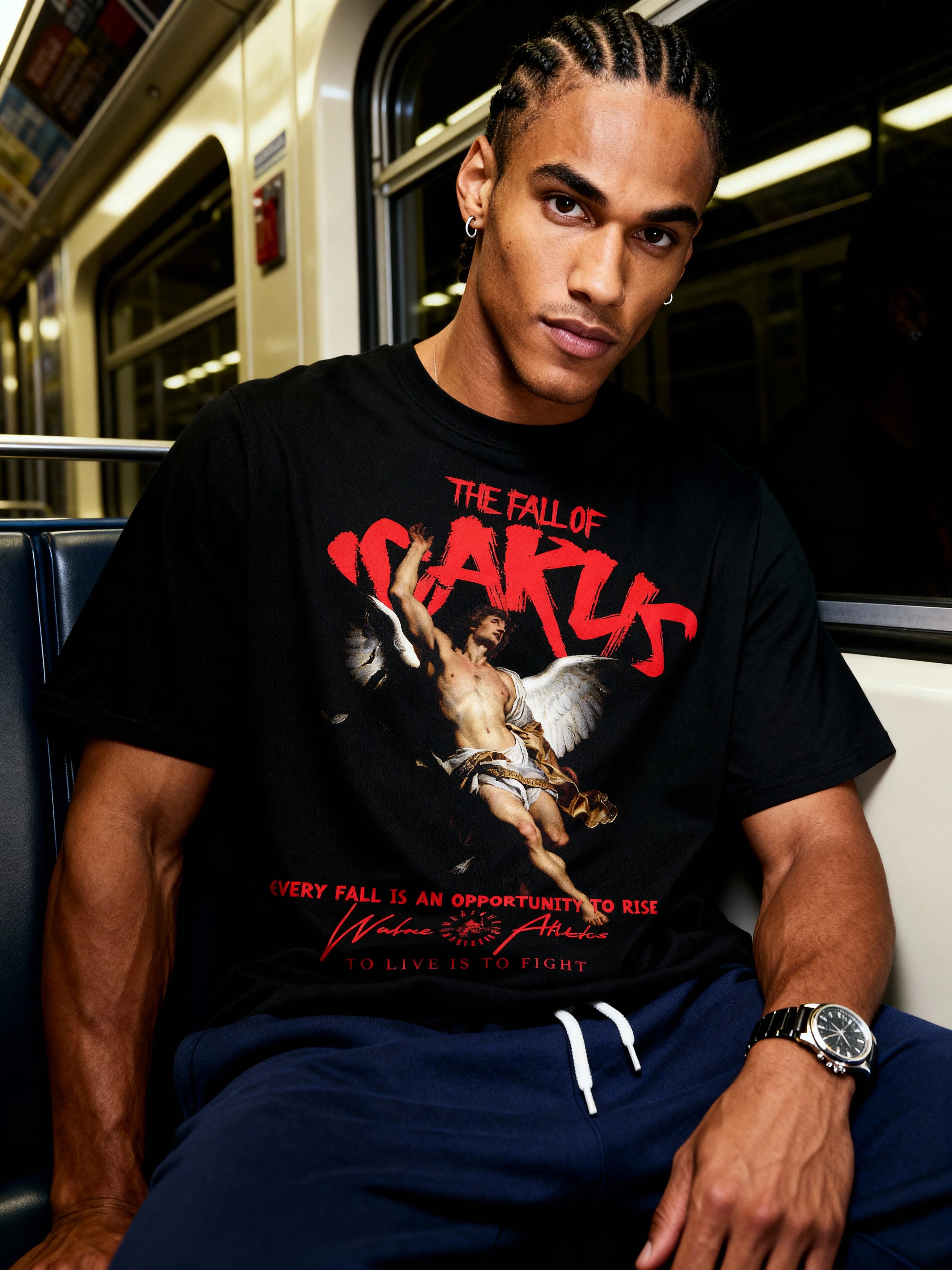Icarus greek mythology heavyweight gym shirt – men wearing Fall of Icarus graphic tee on subway. Warface Athletics.