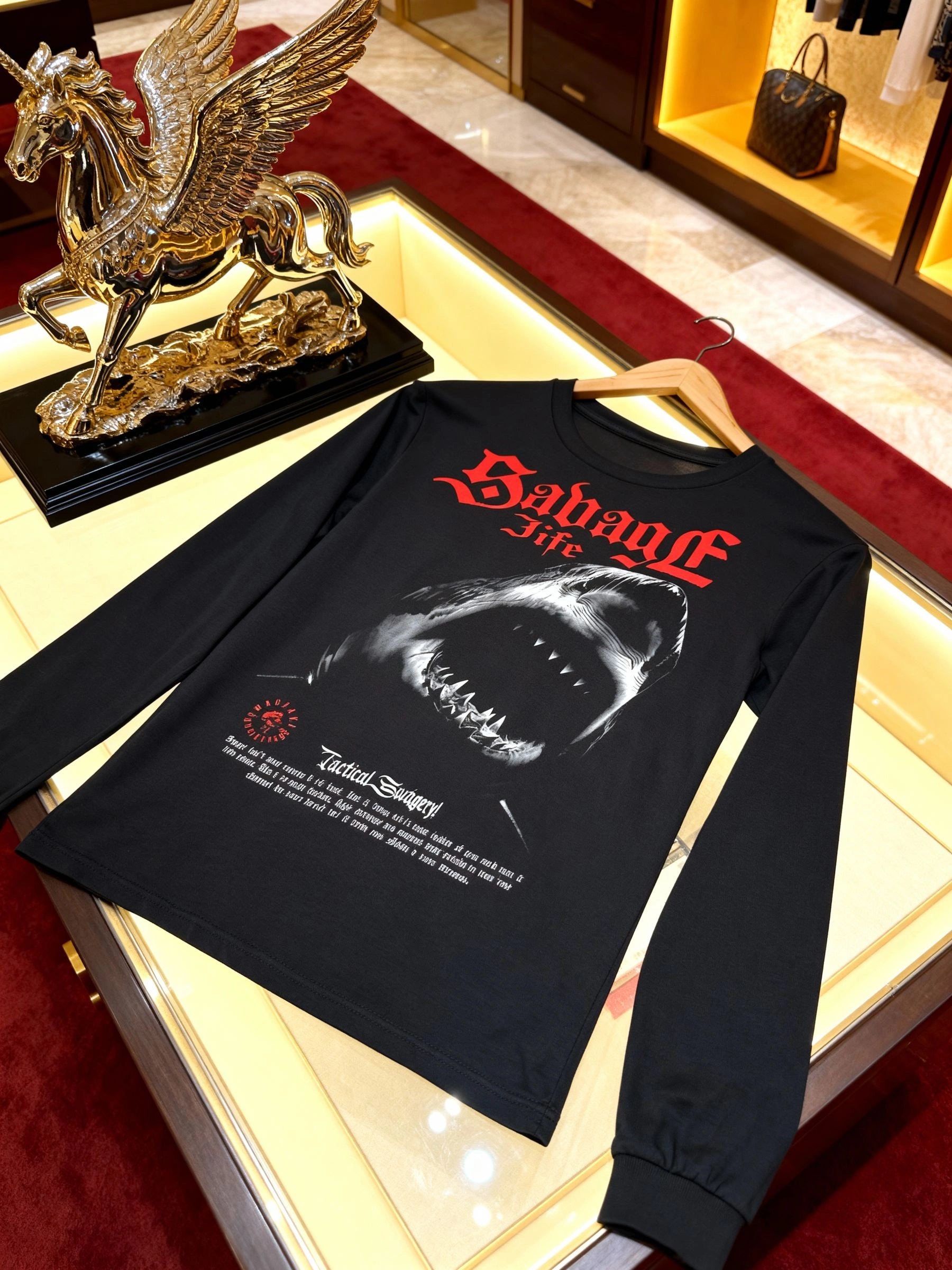 Savage Life shark graphic long sleeve on hanger – men's black gym shirt in luxury boutique, Comfort Colors 6014. Warface Athletics.