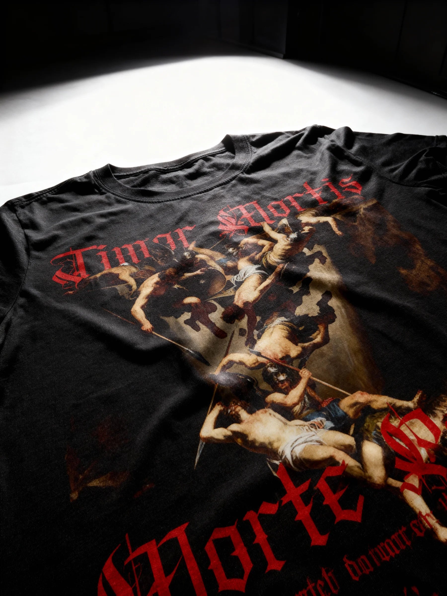 Graphics on t shirts – Timor Mortis Morte Prior red gothic text heavyweight tee fisheye view – Warface Athletics