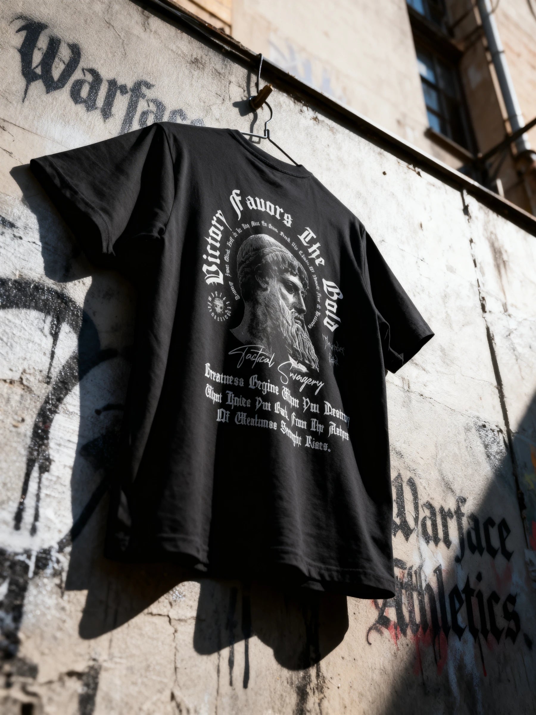 Victory Favors the Bold Tee Lifestyle — Men's Greek God Warrior Shirt with Zeus Bust and Stoic Quote in Dramatic Setting by Warface Athletics