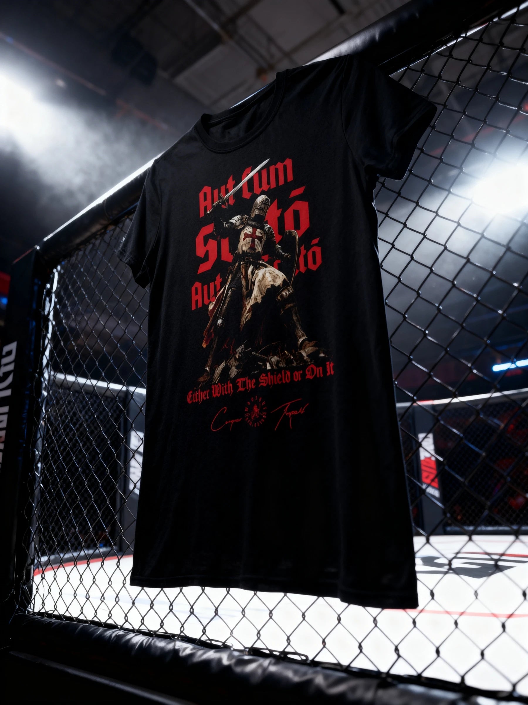 Aut Cum Scuto Aut In Scuto Templar knight tee hanging on UFC cage – men's heavyweight gym shirt. Warface Athletics.