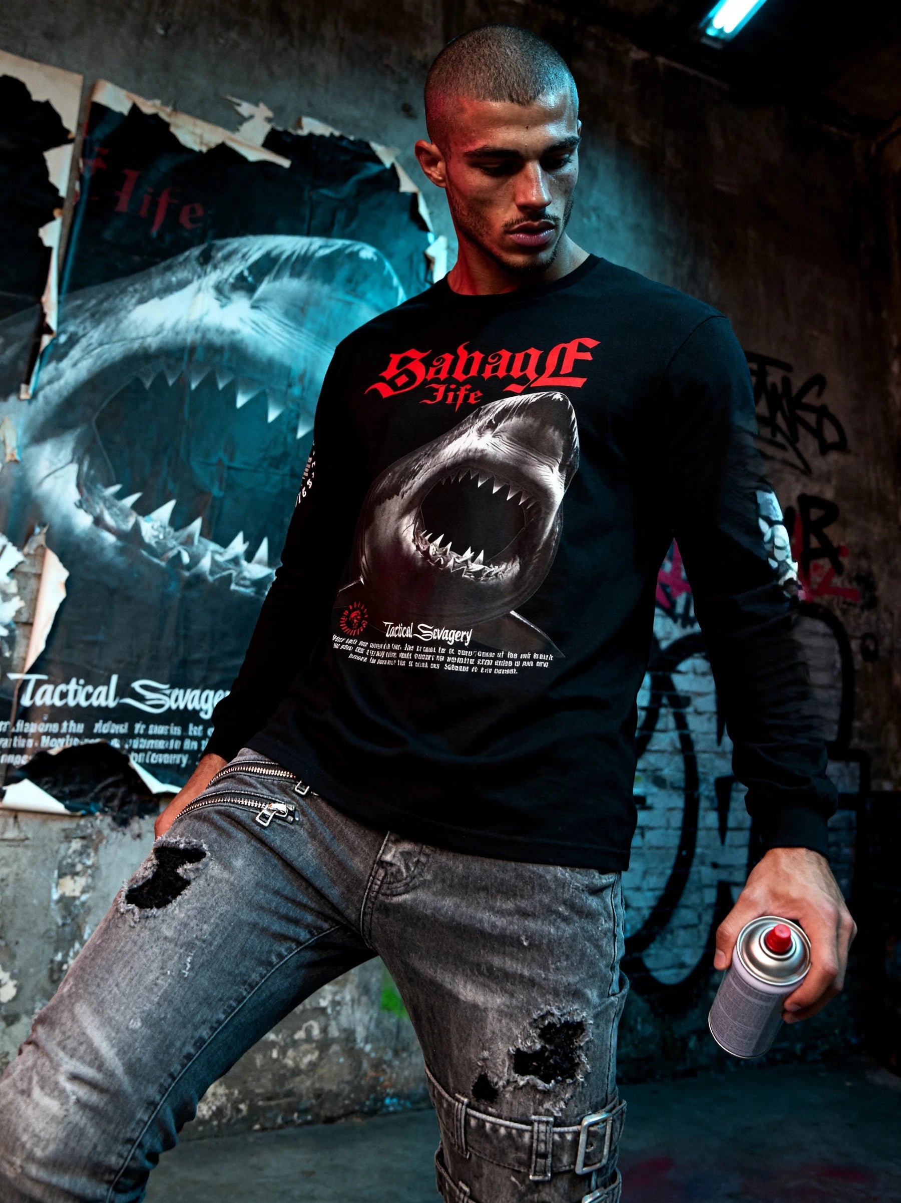Men's shark graphic long sleeve gym shirt – streetwear model in Savage Life tee, graffiti wall alley lifestyle. Warface Athletics.