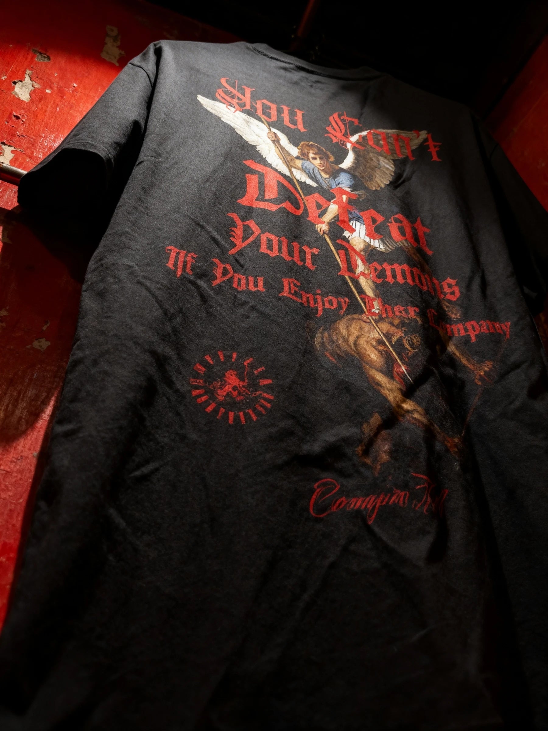 St. Michael heavyweight graphic tee front detail – men's stoic quote gym shirt, red gothic text. Warface Athletics.