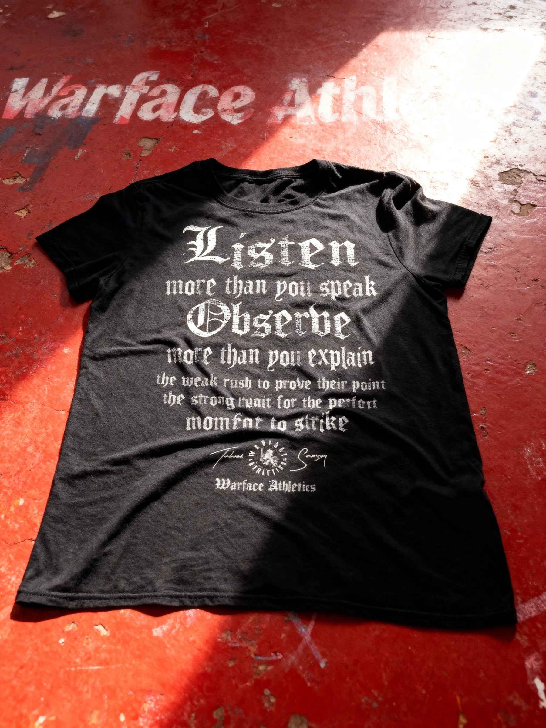 Listen Observe Graphic Tee Display — Men's Stoic Quote Gym Shirt on Red Background by Warface Athletics