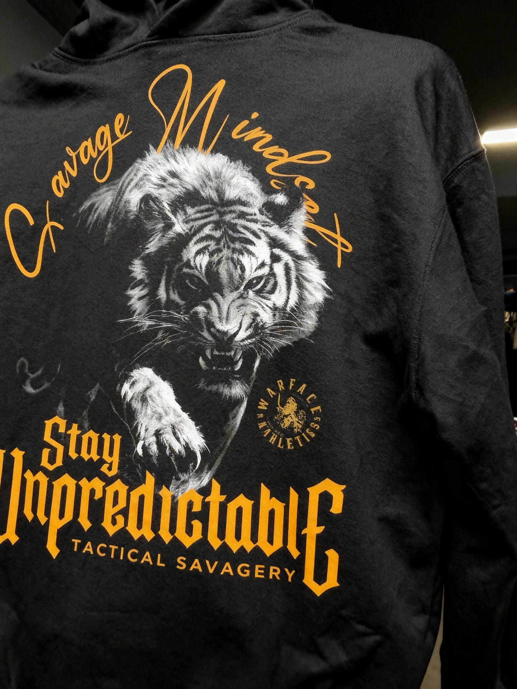 Savage Mindset Stay Unpredictable gym hoodie back print – roaring tiger graphic, men's black graphic hoodie. Warface Athletics.