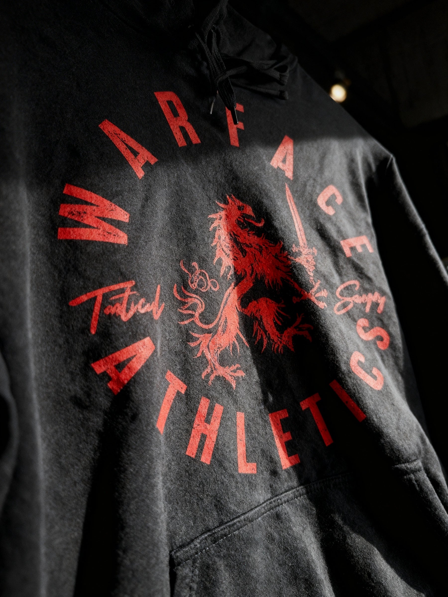 Men's Tactical Savagery graphic hoodie front – Warface Athletics heraldic lion crest, gym hoodie for men. Warface Athletics.