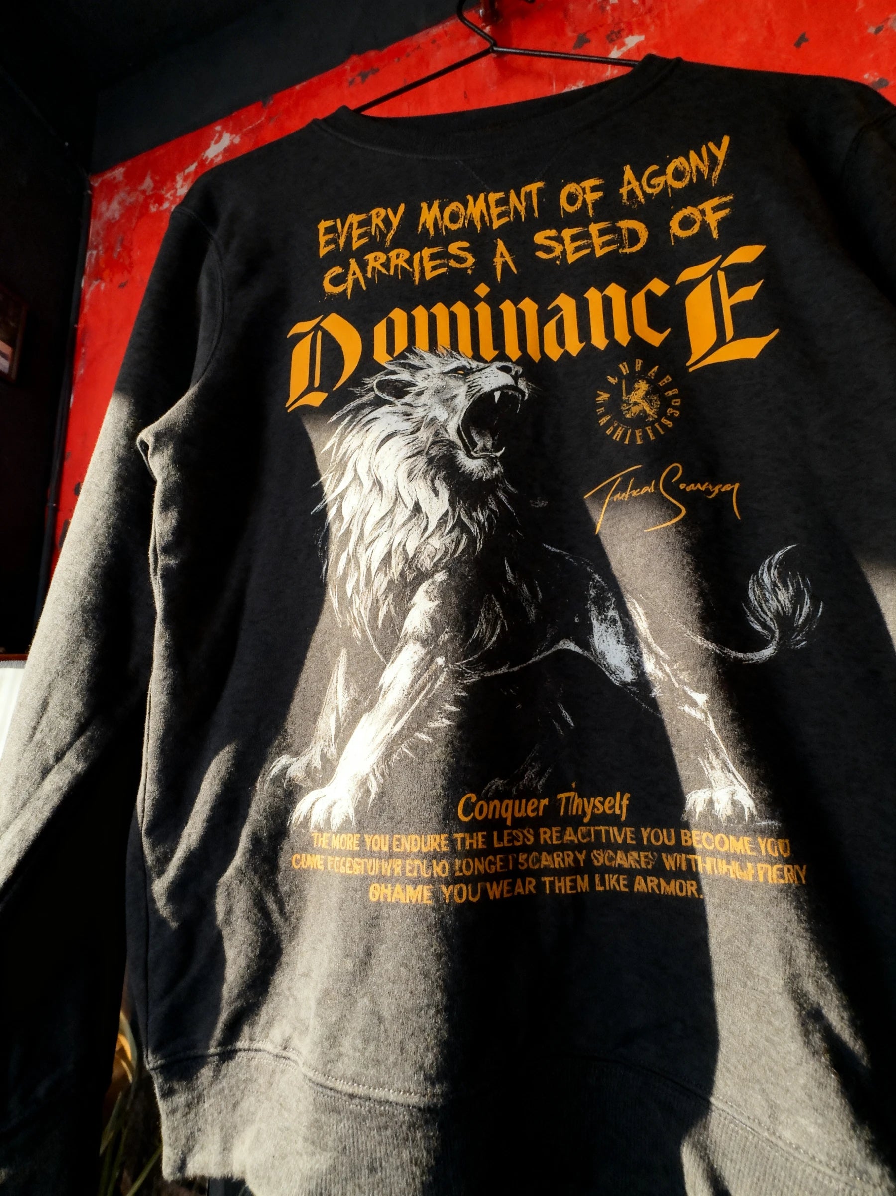 Dominance lion graphic sweatshirt on red background – men's roaring lion pump cover crewneck, gym sweatshirt for men.