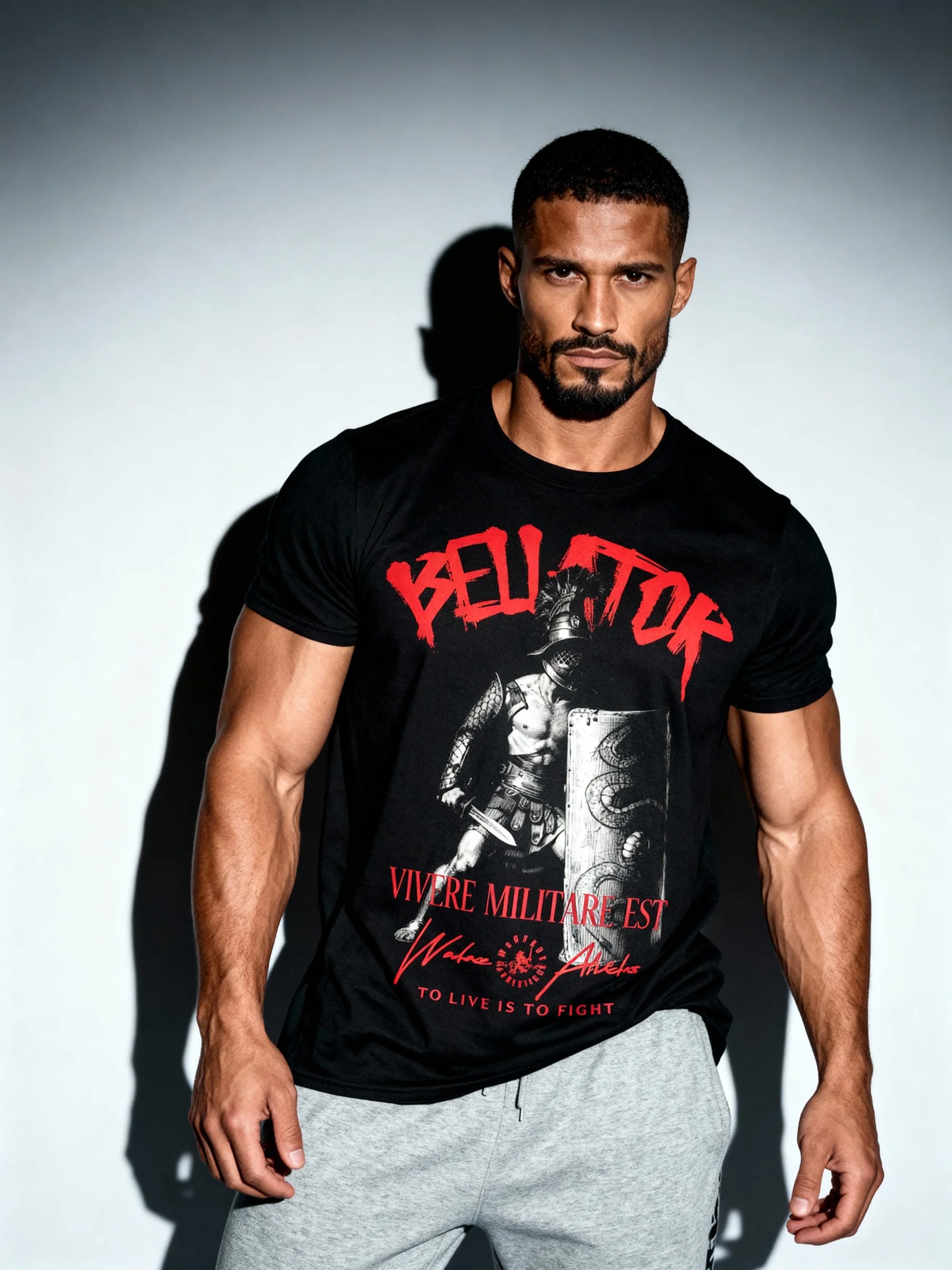 Roman gladiator heavyweight gym shirt – muscular model wearing Vivere Militare Est warrior tee. Warface Athletics.