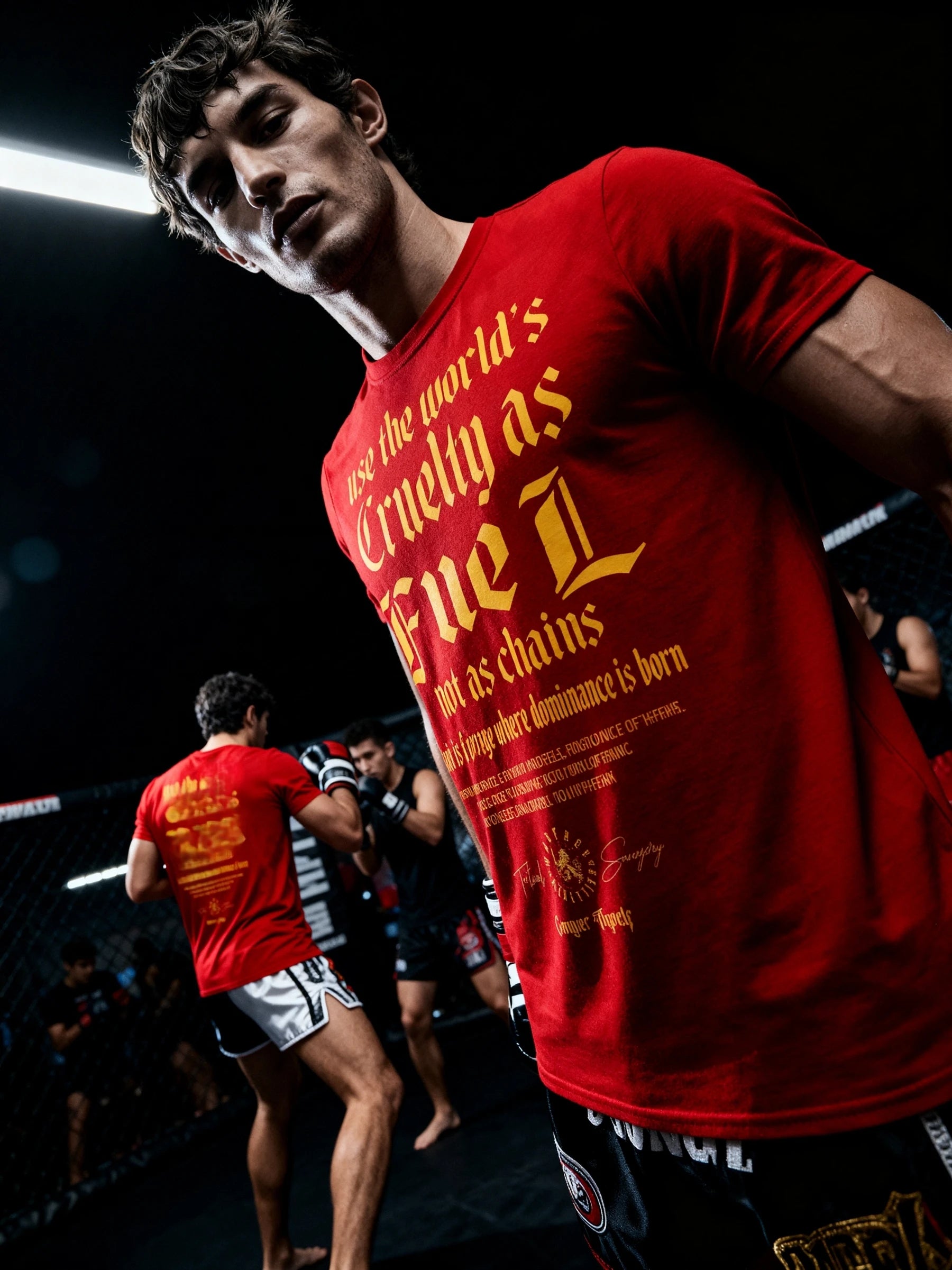 Use The World's Cruelty as Fuel gym shirt – men's red stoic quote tee, MMA arena lifestyle. Warface Athletics.
