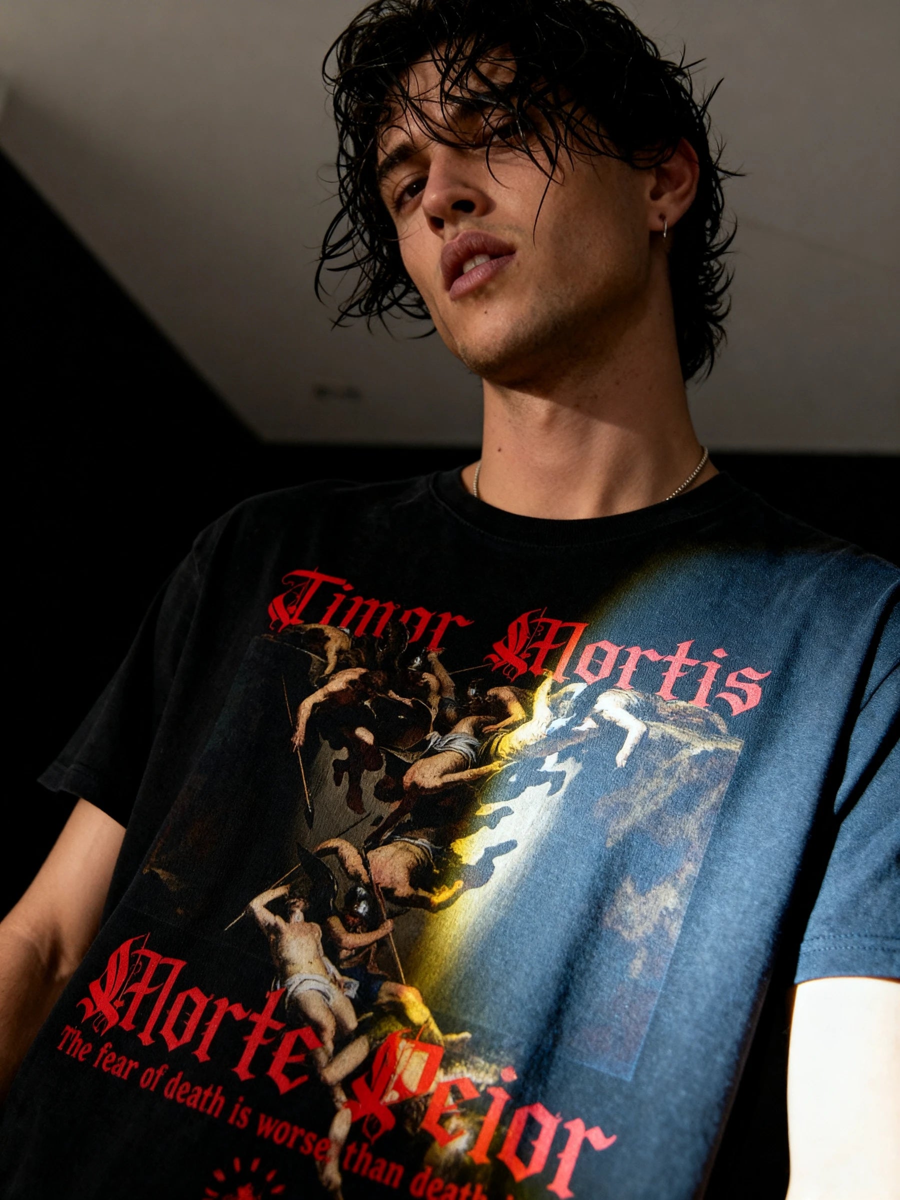 Mens graphic t shirts – model wearing Timor Mortis Latin quote heavyweight tee, moody indoor shot – Warface Athletics