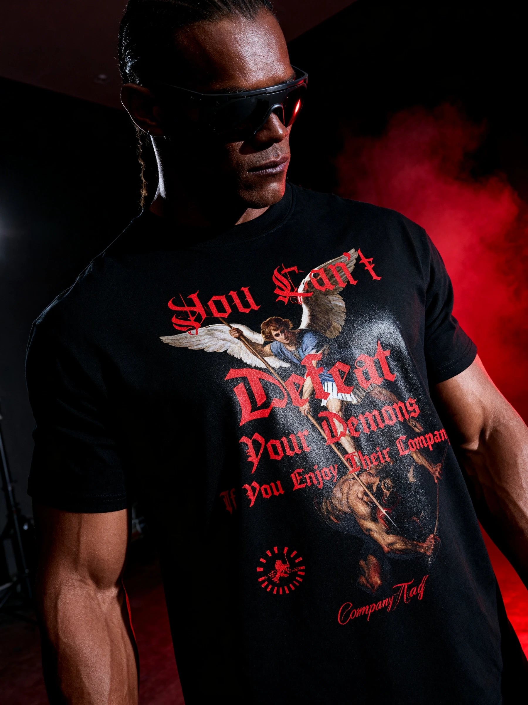 Men's St. Michael gym shirt low angle lifestyle – christian warrior graphic tee, workout shirts for men.