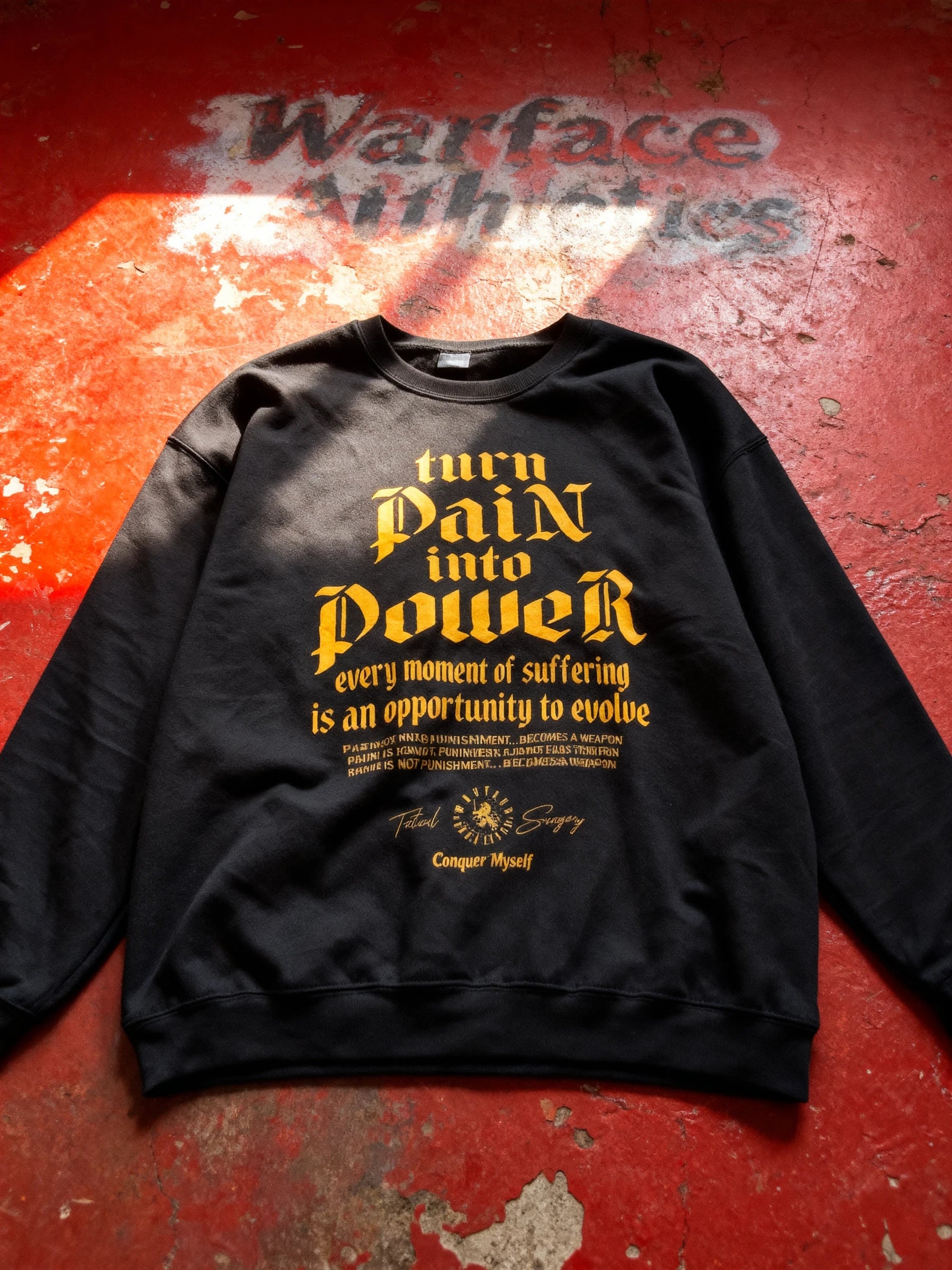 Turn Pain Into Power sweatshirt on red Warface Athletics display – men's stoic typography pump cover crewneck. Warface Athletics.