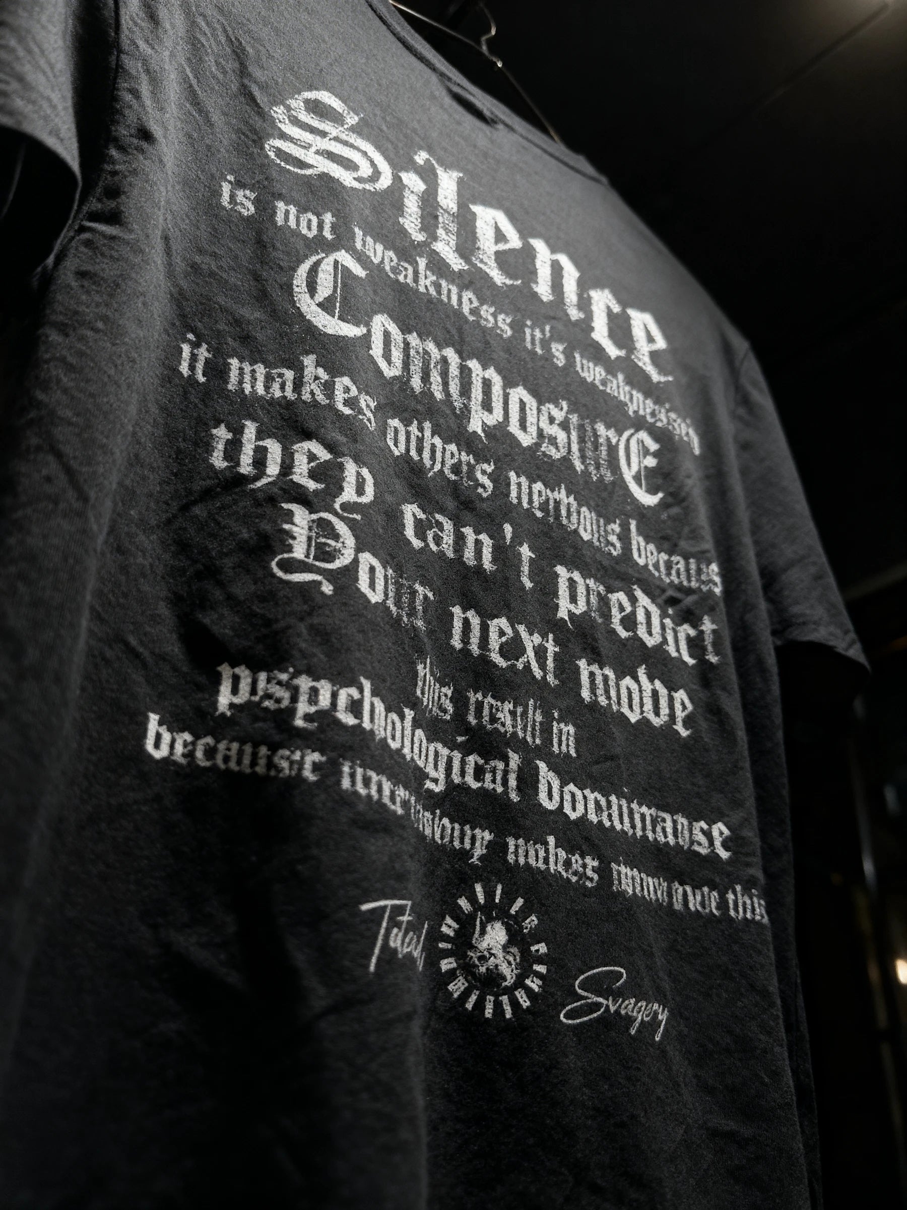 Silence Composure Tee Lifestyle — Men's Stoic Warrior Shirt with White Gothic Back Print in Gym Setting by Warface Athletics
