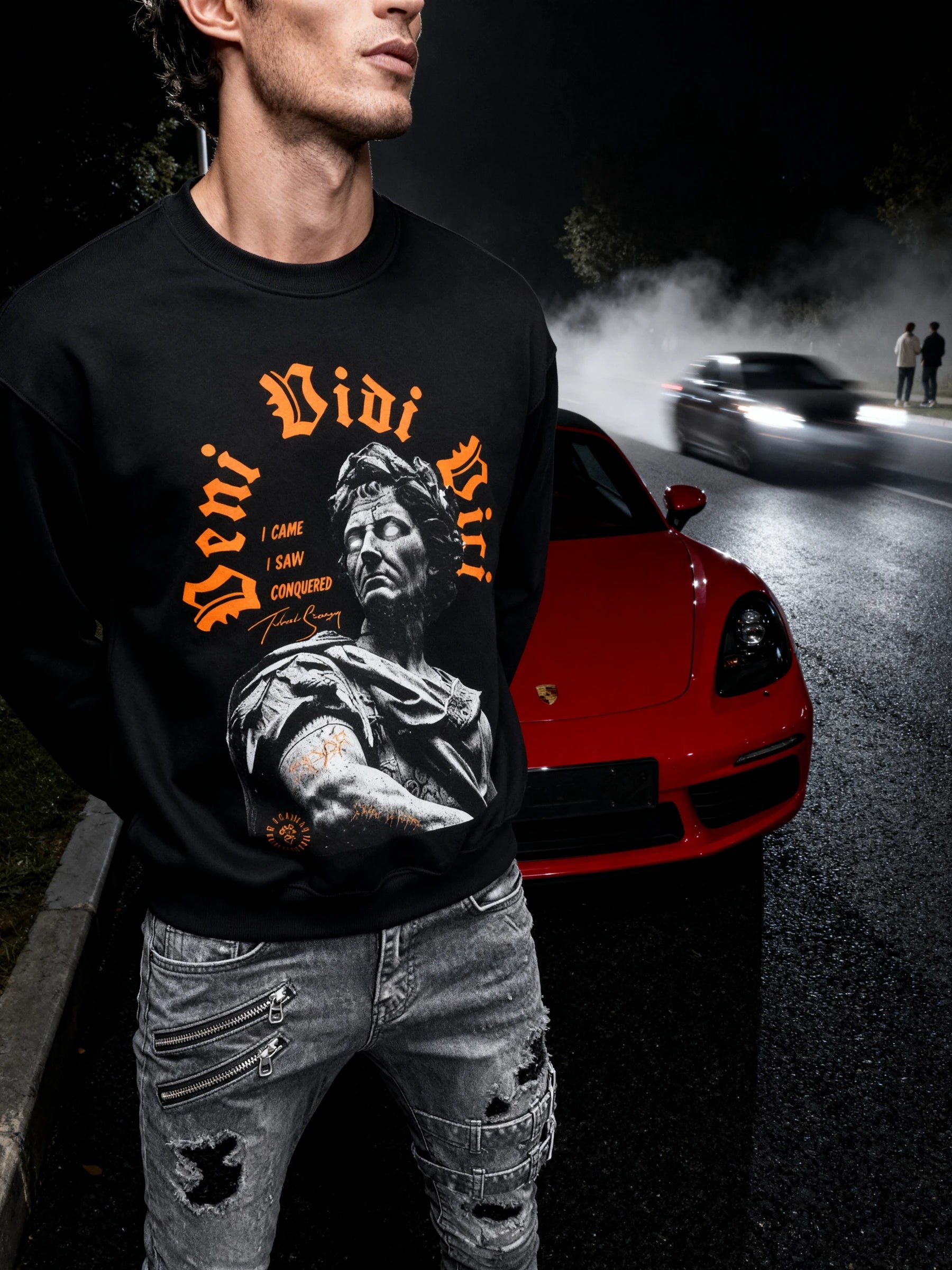Men's Veni Vidi Vici pump cover sweatshirt – streetwear model in Julius Caesar crewneck, red luxury sports car background.